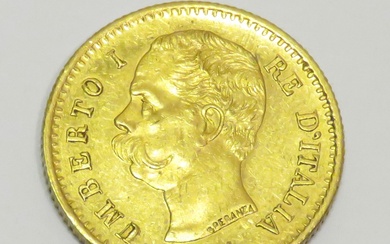 Pièce en or "Humbert Ier-Roi d'Italie", datée de 1881. Poids : 6g45. Diam : 21.5mm....