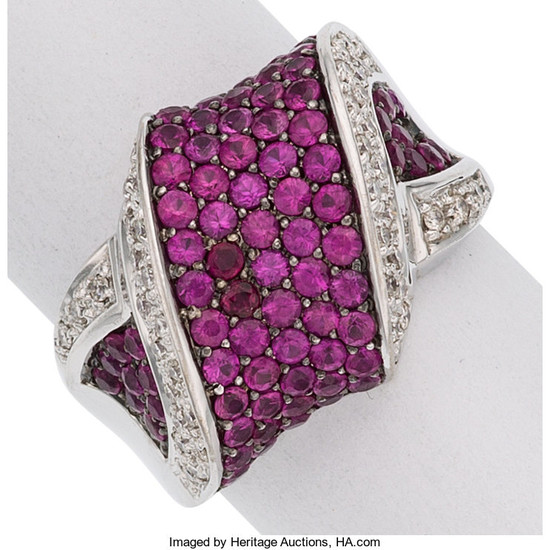 Pink Sapphire, Diamond, White Gold Ring The ring features...