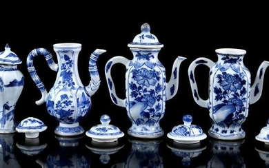 Porcelain miniature jugs, lidded pots and loose lids