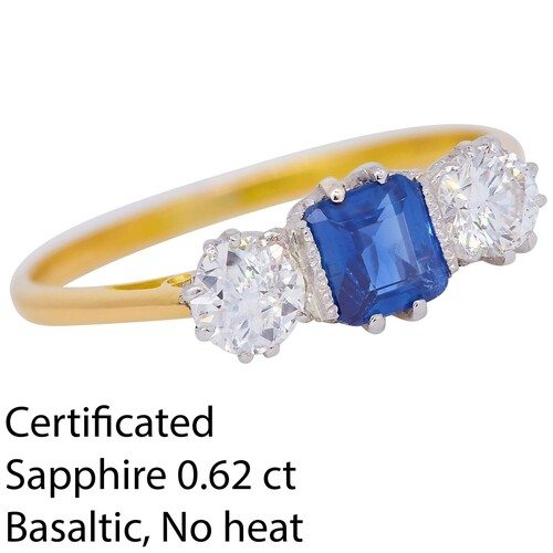SAPPHIRE AND DIAMOND 3-STONE RING, set with a central blue s...