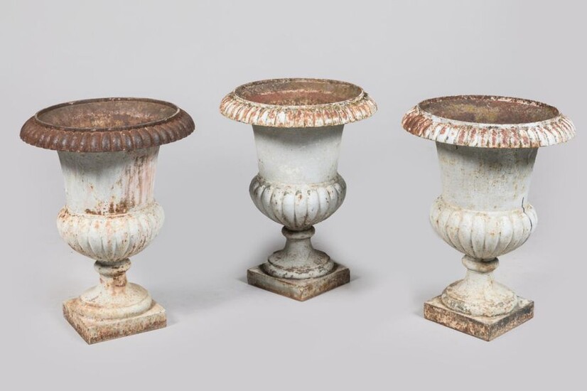 Set of 3 Medici shaped vases in painted cast iron....