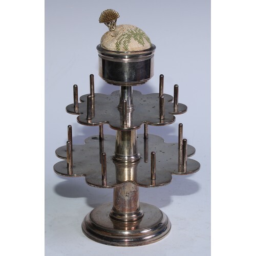 Sewing - an E.P.N.S seamstress's two-tier cotton reel stand,...