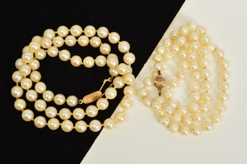TWO CULTURED PEARL NECKLACES WITH 9CT GOLD CLASPS, both desi...