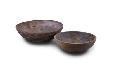 TWO LARGE SYCAMORE CARVED BOWLS, the largest with thick...