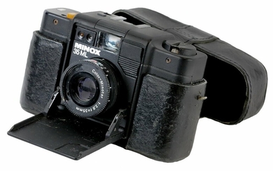 The Compact Camera carried by Pen Hadow in 2003 Minox fixed-lens 35mm camera, with leather out...