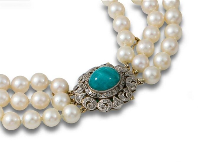Three strands of cultured pearls,and platinum and