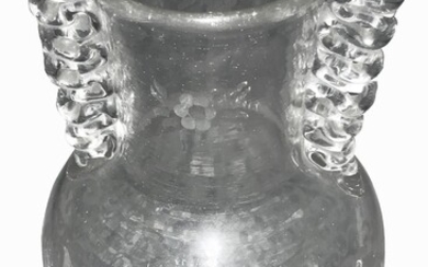 Toso Ferro. 1920. Vase en verre transparent en forme de balustre. Décoration portable sous la...