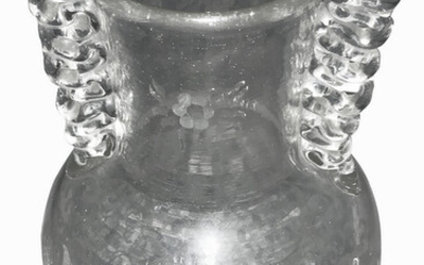 Toso Ferro. Anni ‘20. Vaso in vetro trasparente a forma di balaustra. anse a...