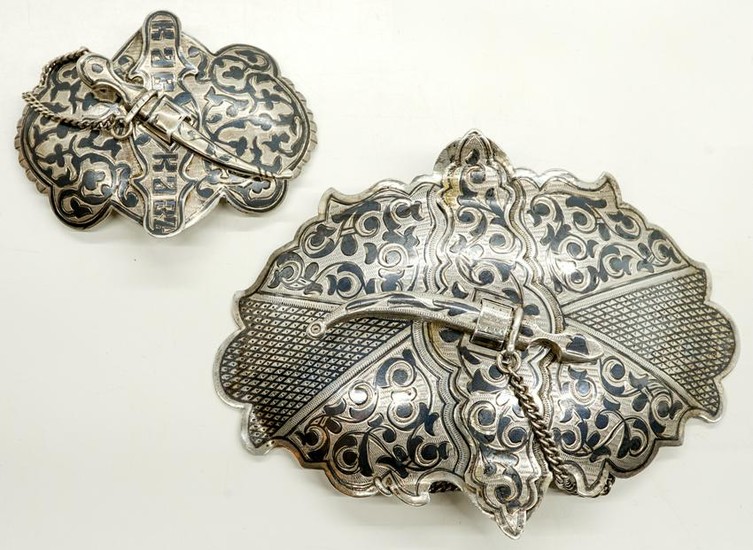 Two Russian Silver and Niello Belt Buckle Sets