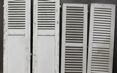 Two pair of early 20th century white painted French louvre shutter doors, comprising an arched pair