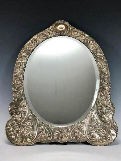 A LARGE VICTORIAN STERLING SILVER MIRROR