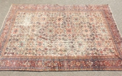 A LARGE PERSIAN KARAJA CARPET with seven central