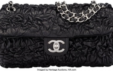 16053: Chanel Black Bubble Quilted Lambskin Leather Med