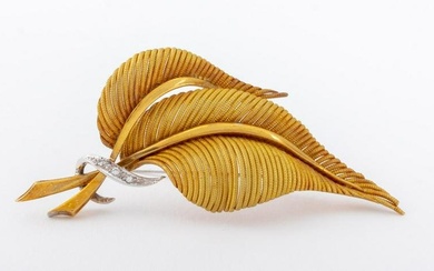 18K yellow gold, brightly polished and satin finished, designed as two leaves with twisted wires