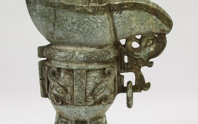 Chinese Zhou style carved stone tripod jue vessel, 9"h