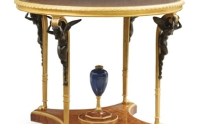 François Linke (1855 - 1946) A French gilt-bronze mounted burr amboyna centre table, circa 1900, after the model of Adam Weisweiler