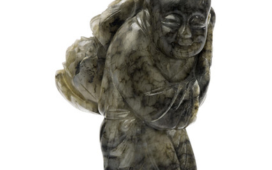 A MOTTLED GREY AND BLACK JADE 'BOY AND PEONY' CARVING, 18TH CENTURY