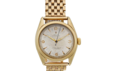 Rolex. A 9K gold automatic bracelet watch
