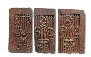 A set of three late 15th/early 16th century carved oak panels, French