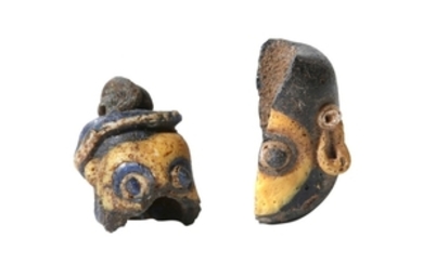 TWO PHOENICIAN FACE FRAGMENTS Circa 3rd – 1st...