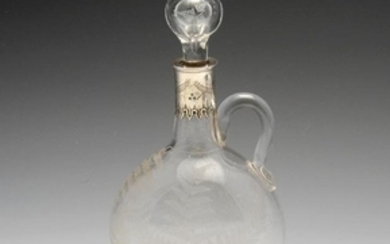 A Victorian silver mounted glass claret jug, the clear