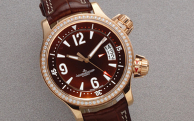 Jaeger-LeCoultre. An 18K gold and diamond set automatic calendar wristwatch