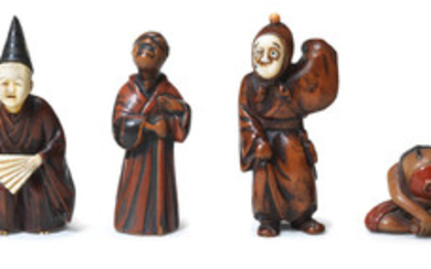 Two wood and ivory figure netsuke and two lacquered wood figure netsuke