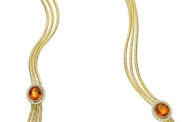 Citrine, Diamond, Gold Necklace The necklace features oval-shaped...