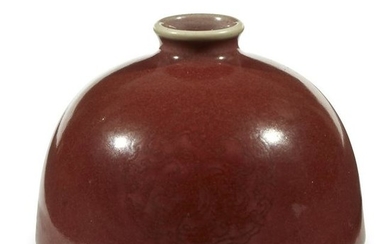 A Chinese copper red-glazed water coupe, Taibo Zun