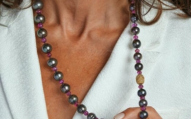 91 A cultured pearl, ruby, fancy diamond and gold