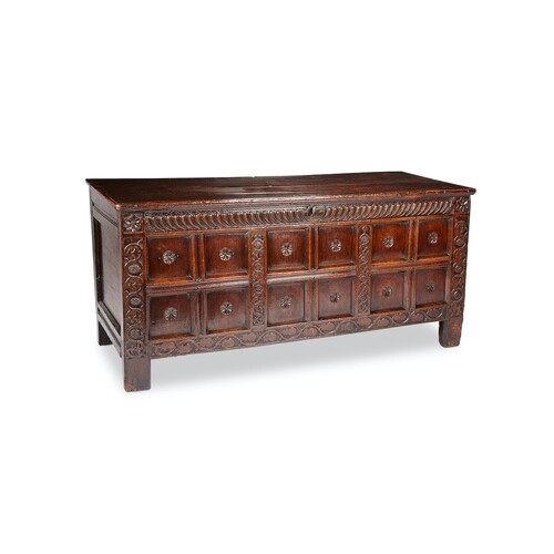 A 17th century oak chest, North Country The hinged lid above...