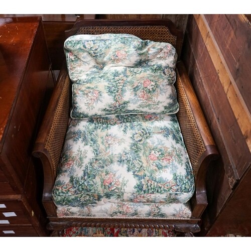 A 1920's mahogany single caned bergere armchair, width 75cm,...