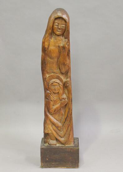 A 20th century carved hardwood figure group, modelled as the Madonna and Child, mounted on a wooden