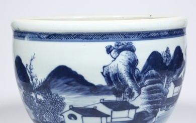 A BLUE-AND-WHITE PORCELAIN TABLE TANK.