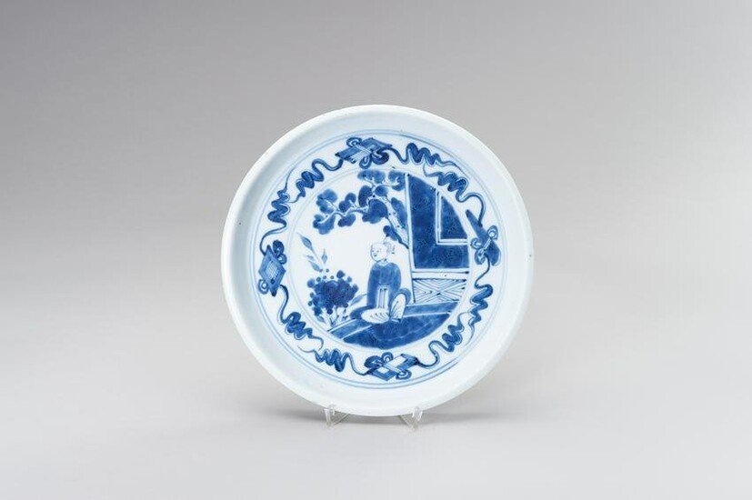 A BLUE AND WHITE PORCELAIN TRAY WITH A COURT BOY