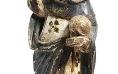 A CARVED PINE AND POLYCHROME DECORATED FIGURE OF...