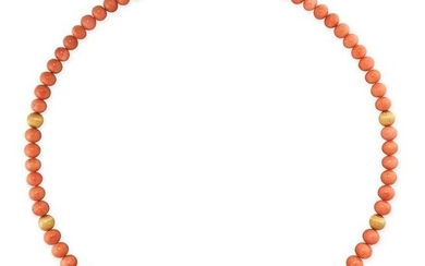 A CORAL BEAD NECKLACE in yellow gold, comprising of a