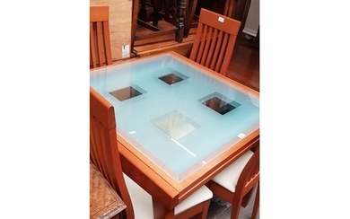 A Calligaris Italian extending glass top dining table and fo...
