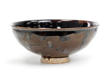 A Chinese Henan 'papercut' black and russet-glazed bowl Song dynasty The buff...