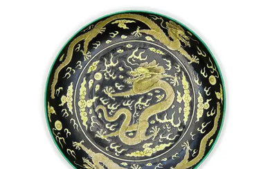 A Chinese black ground 'five dragons' plate Republic period Raised on short...