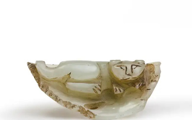 A Chinese celadon jade 'cat on leaf' carving Qing dynasty, 19th century...