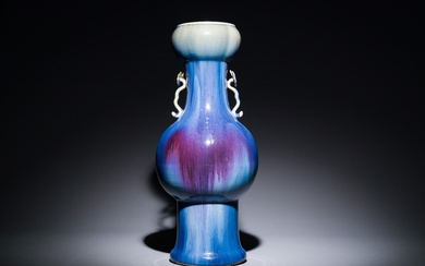 A Chinese flambe-glazed garlic-mouth vase with ruyi handles, 19th C.