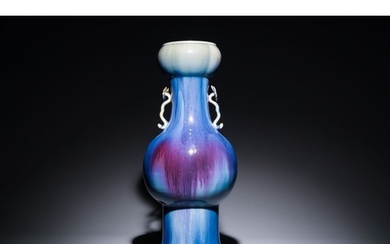 A Chinese flambe-glazed garlic-mouth vase with ruyi handles,...