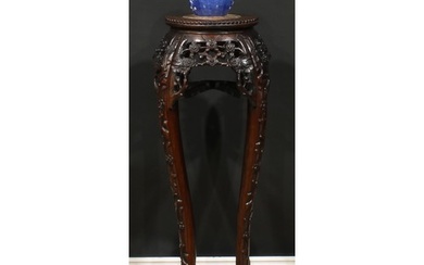A Chinese hardwood jardiniere stand, circular top with beade...