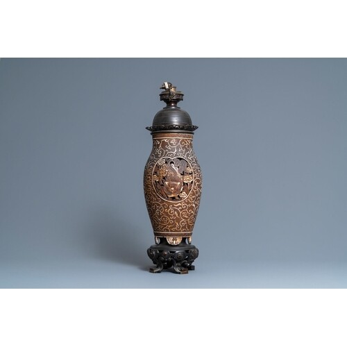 A Chinese reticulated biscuit 'Buddhist lions' vase mounted ...