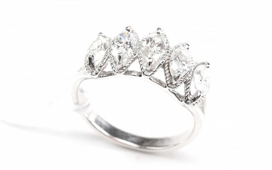A DRESS RING IN 18CT WHITE GOLD, COMPRISING FIVE MARQUISE CUT DIAMONDS TOTALLING 1.34CTS, SIZE N, 3.9GMS