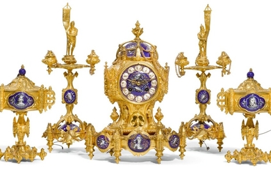 A FRENCH GILT-BRONZE AND PAINTED PORCELAIN FIVE-PIECE GOTHIC REVIVAL MANTEL CLOCK GARNITURE, CIRCA 1860