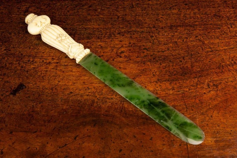 A Fine 19th Century Jade Page Turner with carved & reeded ivory handle decorated with a swag of frui