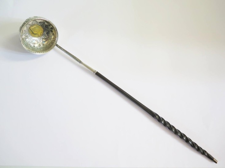 A Fine George II Silver Toddy Ladle with embossed harebell s...