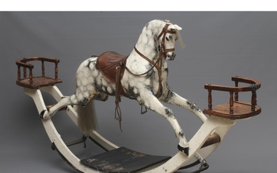 A G & J Lines rocking horse, late 19th century, of carved wo...